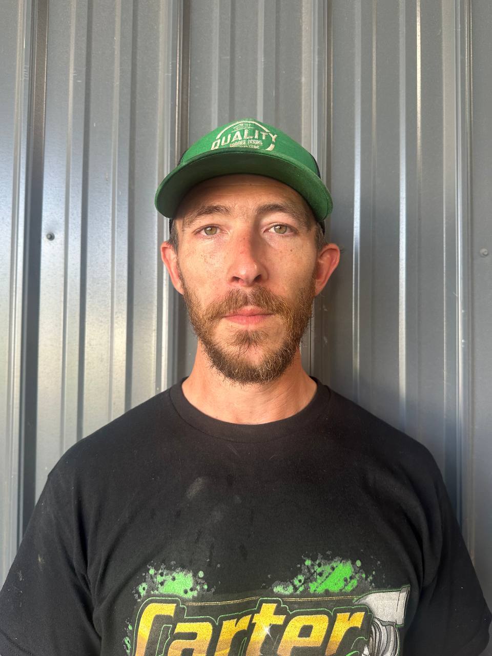 Adam Smith, Field Service Technician at Quality Garage Doors & Gutters.